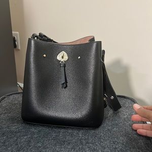 Cute Kate Spade black purse. Dress it up or down